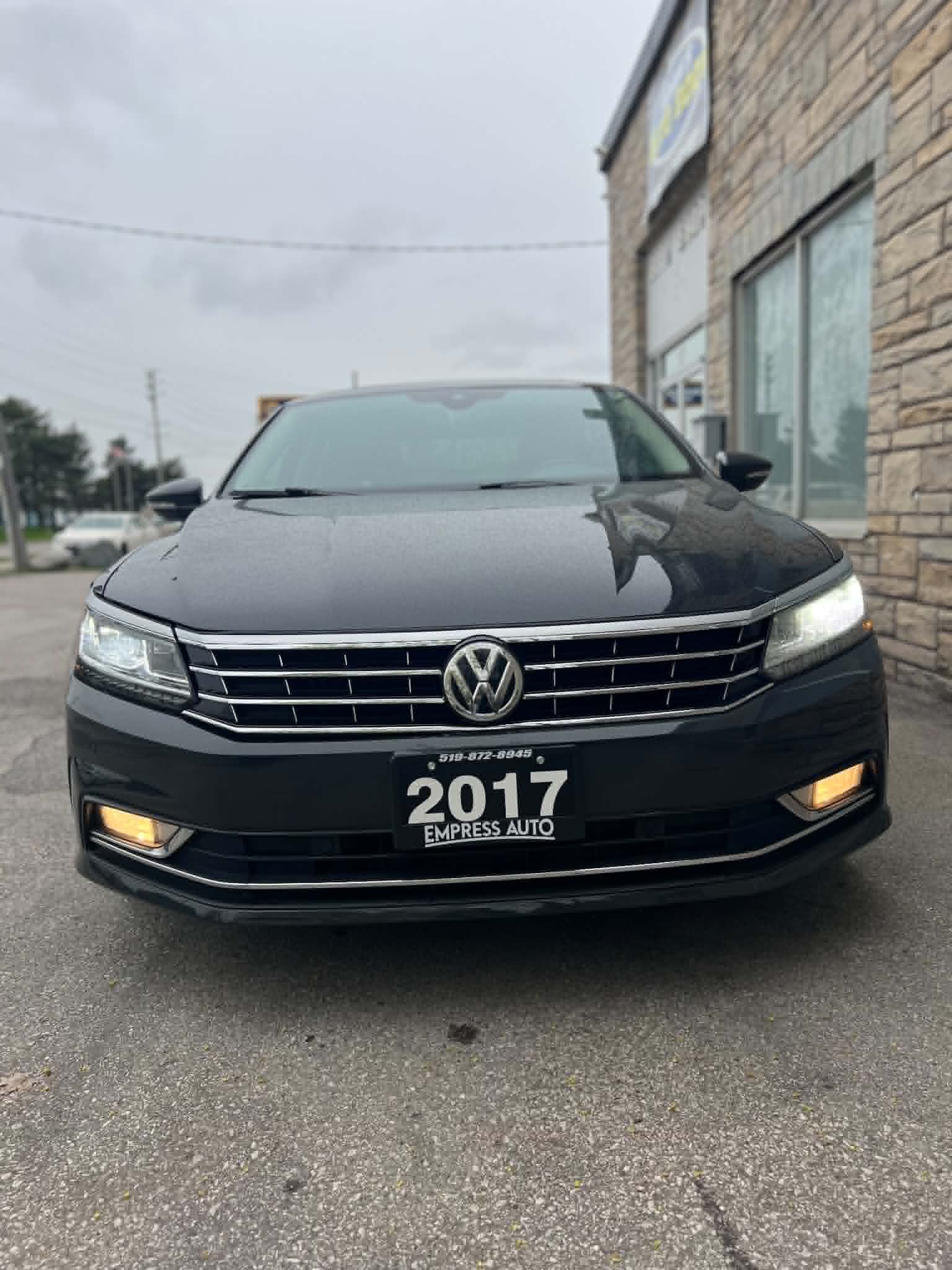 Before and after collision repair on a silver sedan — after